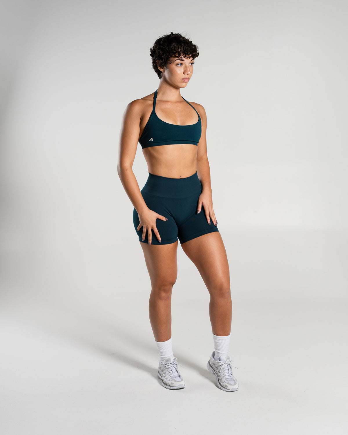 Alphalete Women's Amplify Mid Rise Short