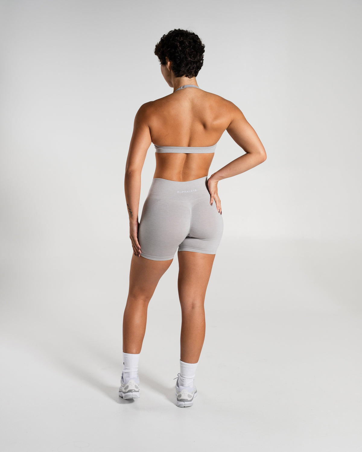 Alphalete Women's Amplify Mid Rise Short