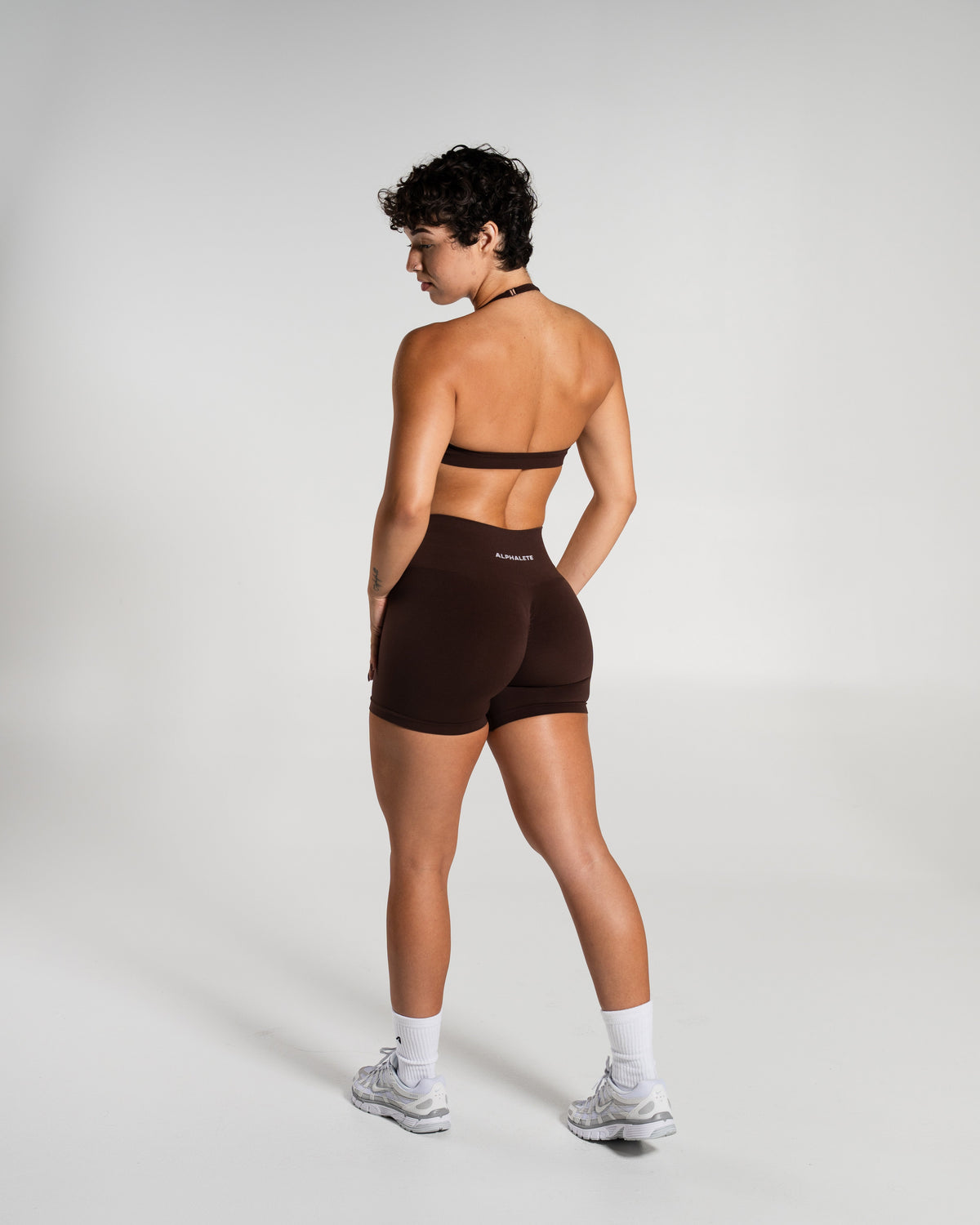 Alphalete Women's Amplify Mid Rise Short