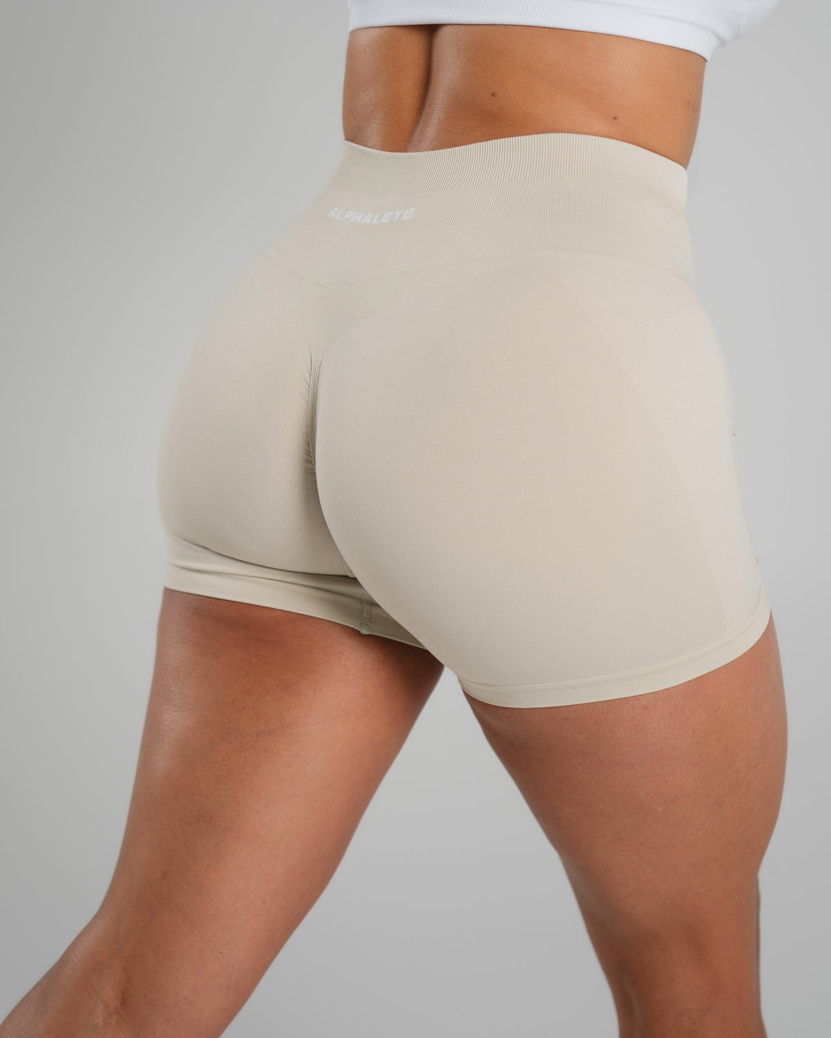 Alphalete Women's Amplify Mid Rise Short
