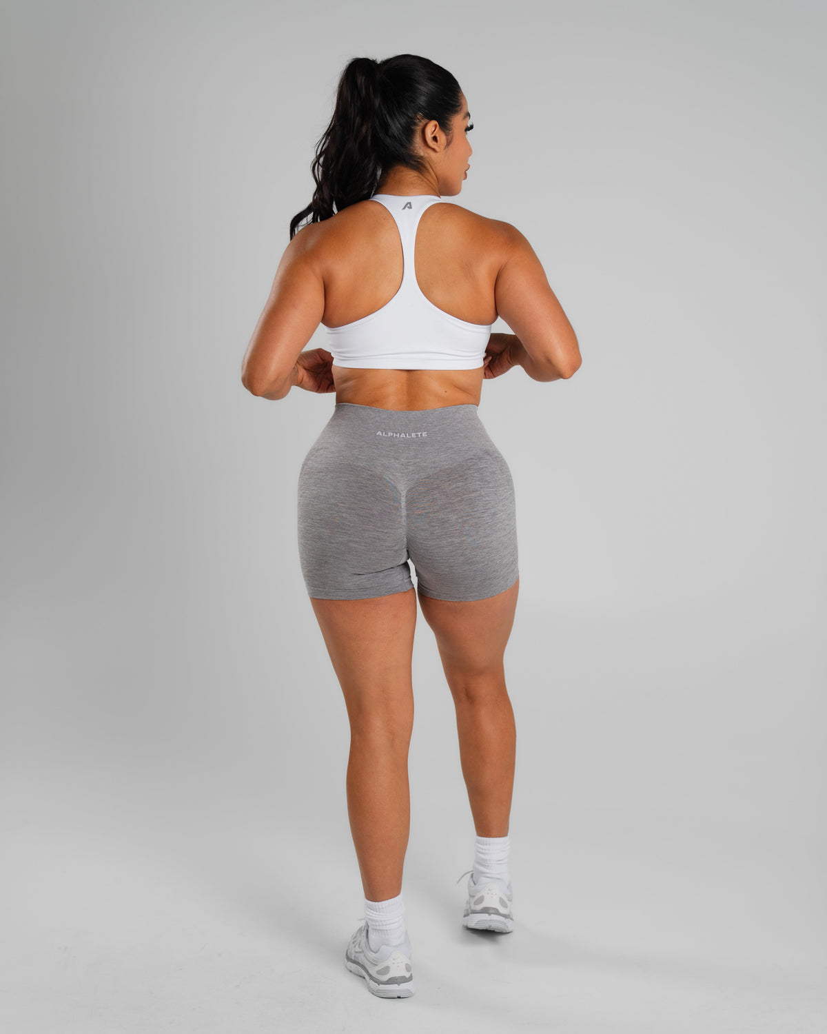 Alphalete Women's Amplify Mid Rise Short