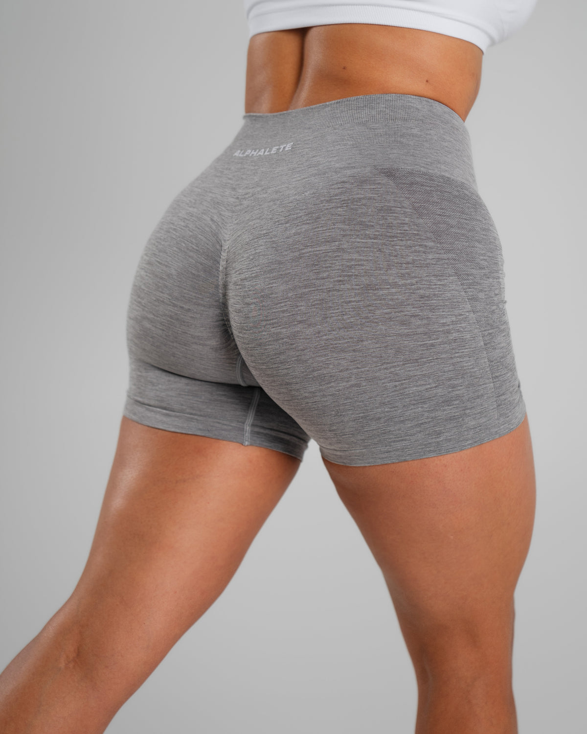 Alphalete Women's Amplify Mid Rise Short