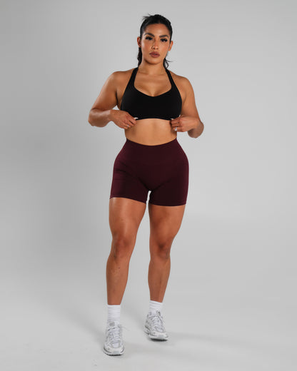 Alphalete Women's Amplify Mid Rise Short