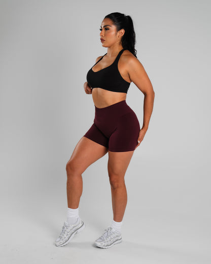 Alphalete Women's Amplify Mid Rise Short
