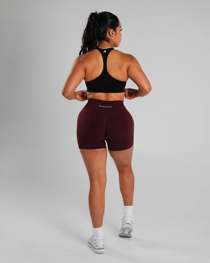 Alphalete Women's Amplify Mid Rise Short
