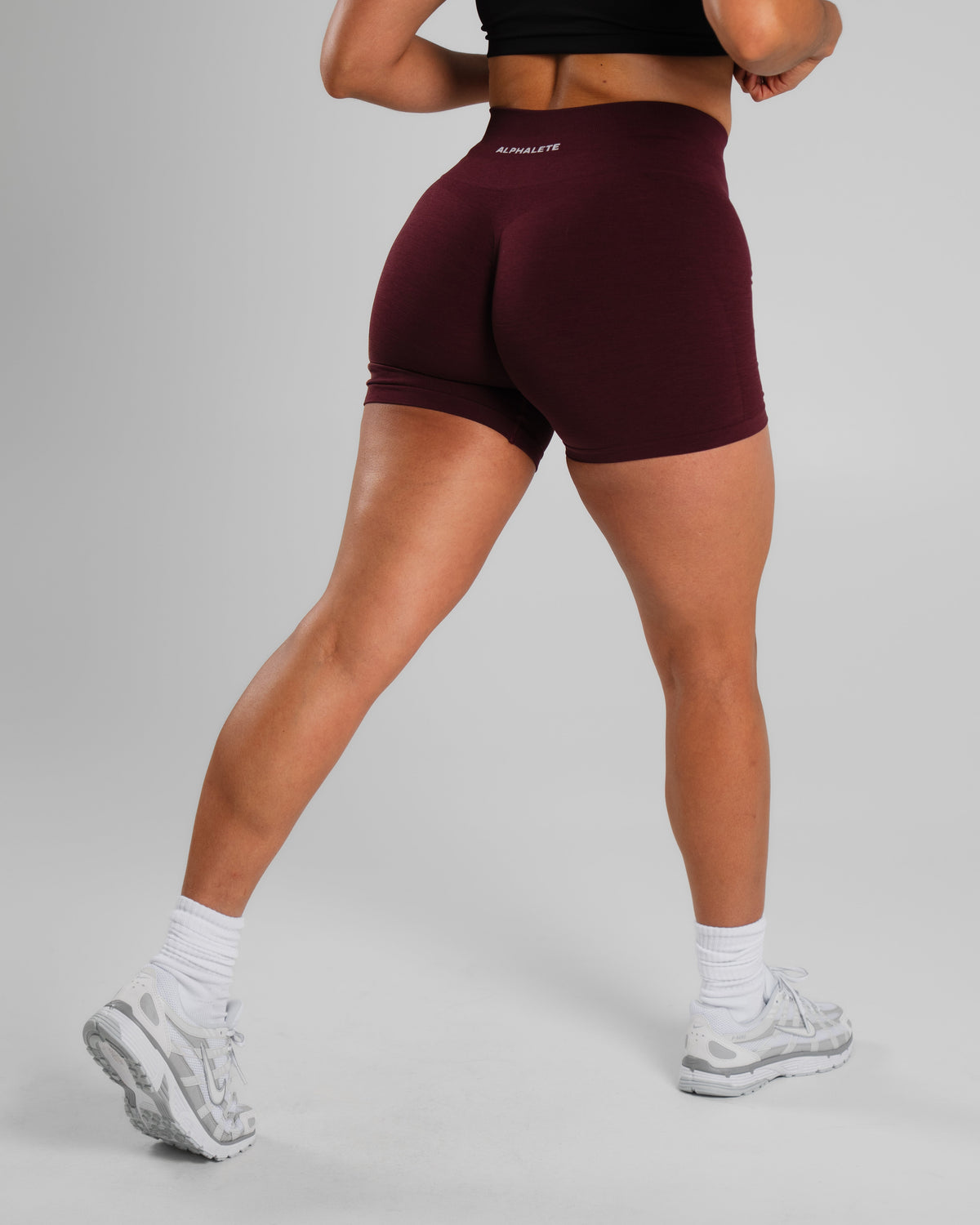 Alphalete Women's Amplify Mid Rise Short