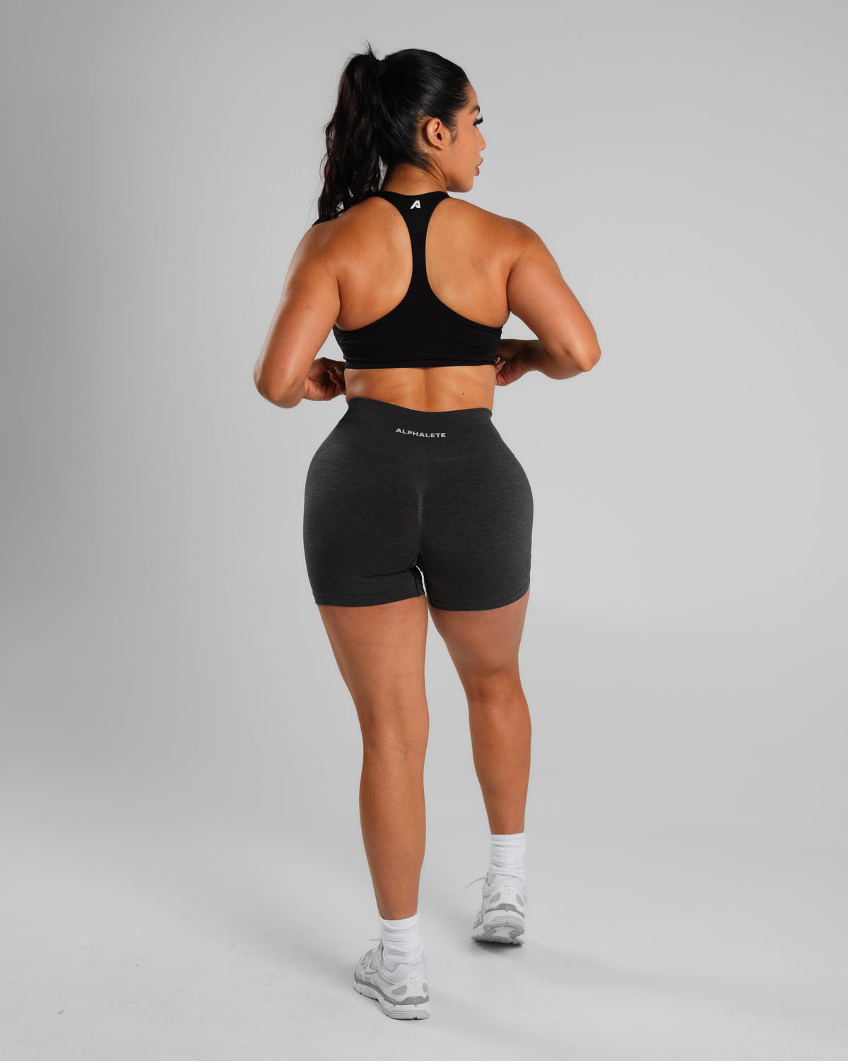 Alphalete Women's Amplify Mid Rise Short