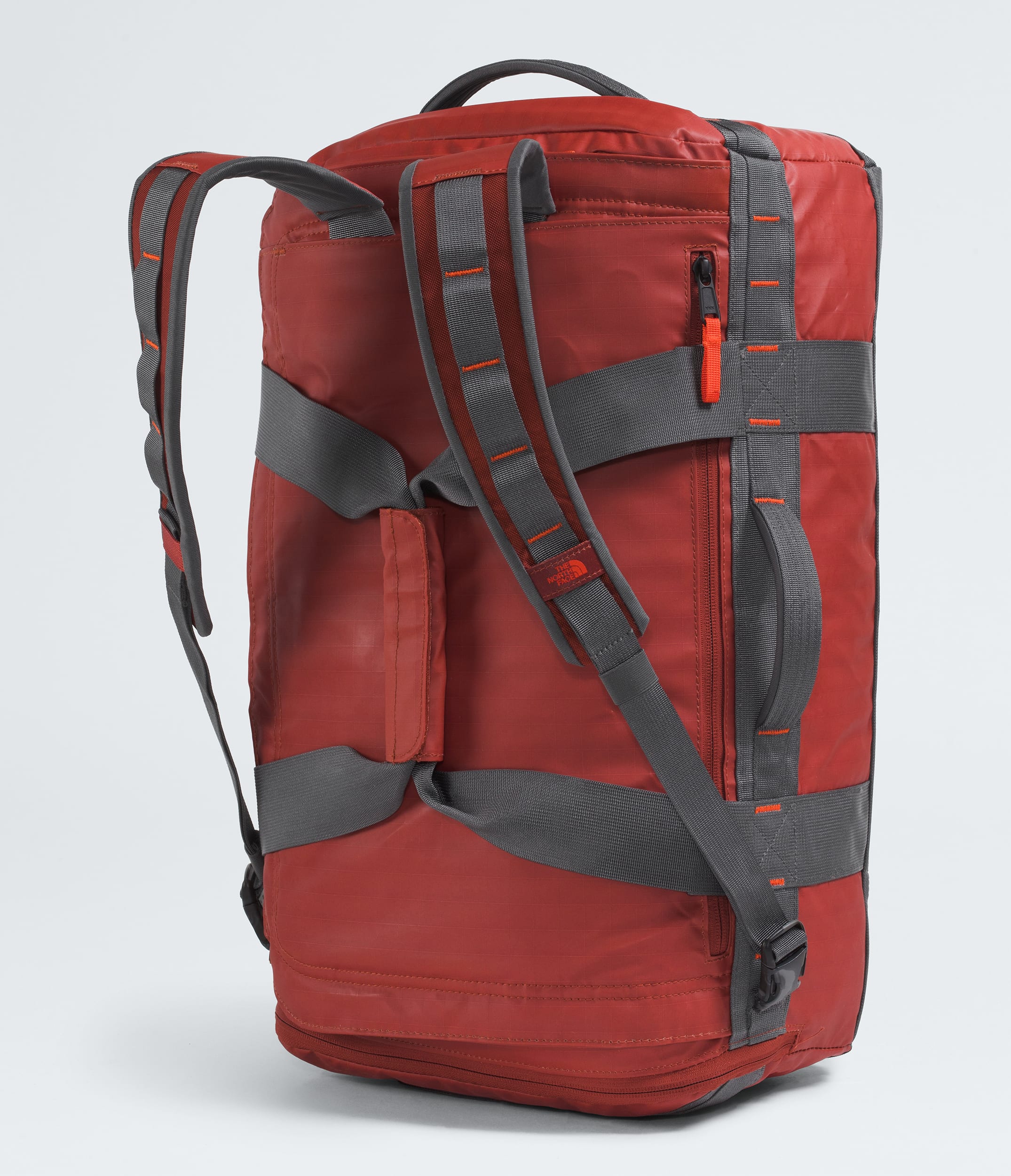 The North Face Base Camp™ Voyager Duffel—42L Iron Clay-Anthracite Grey-Lava Red