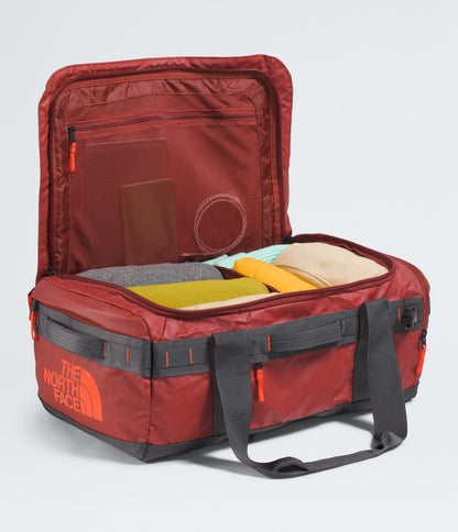 The North Face Base Camp™ Voyager Duffel—42L Iron Clay-Anthracite Grey-Lava Red