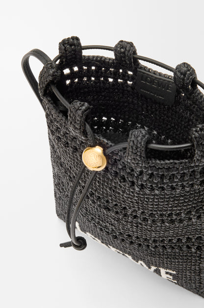 Loewe Drawstring pocket in raffia