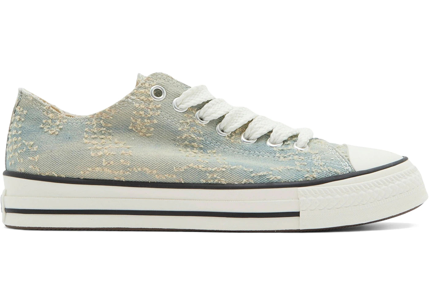 Converse Chuck Taylor All Star Throwback Low in denim blue and vintage white, the classic canvas silhouette that runs half a size large.
