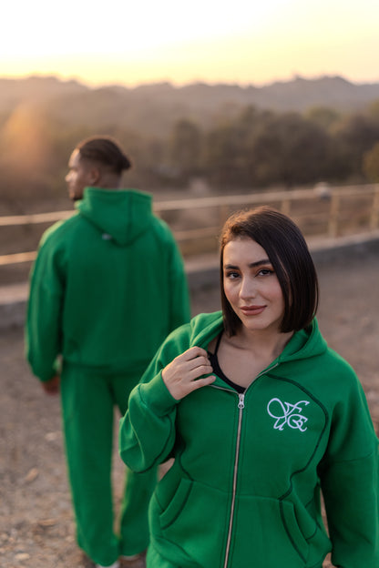 FUE Everyday Essential Sweatpants Green - two models wearing green tracksuits outdoors with scenic background