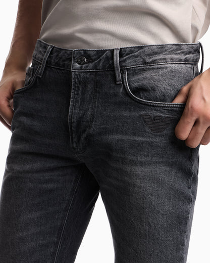 Emporio Armani J06 slim-fit washed denim jeans with eagle embroidery