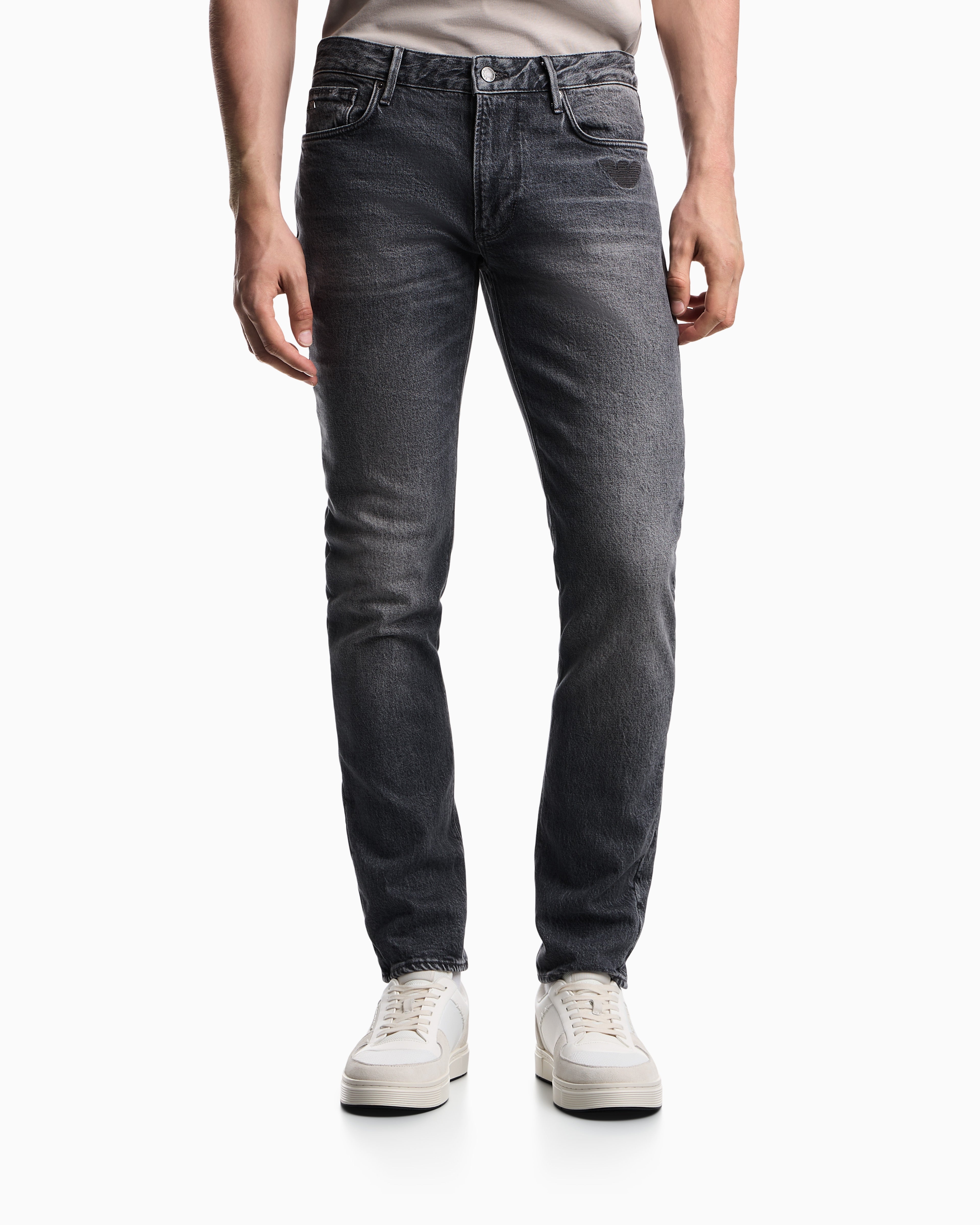 Emporio Armani J06 slim-fit washed denim jeans with eagle embroidery