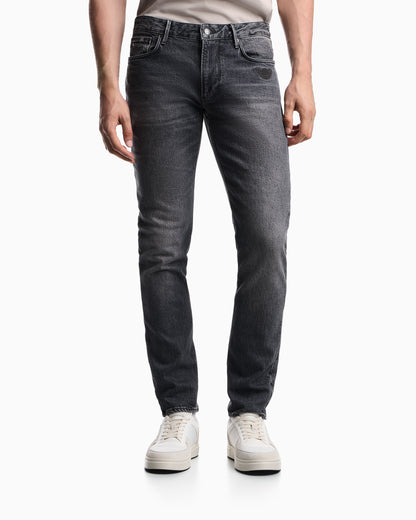 Emporio Armani J06 slim-fit washed denim jeans with eagle embroidery