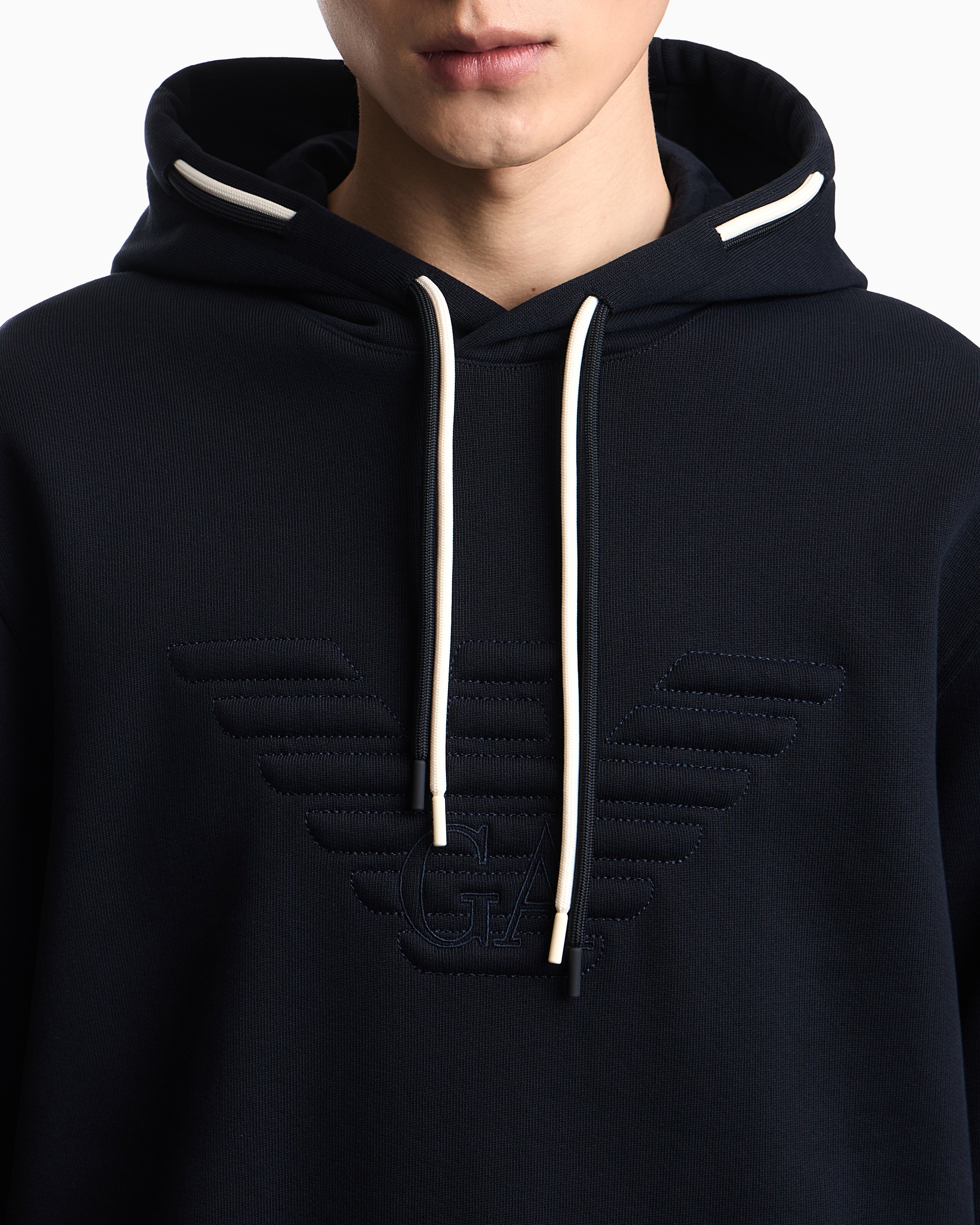 Emporio Armani Loose-fit hooded sweatshirt in French terry jersey with a domed eagle