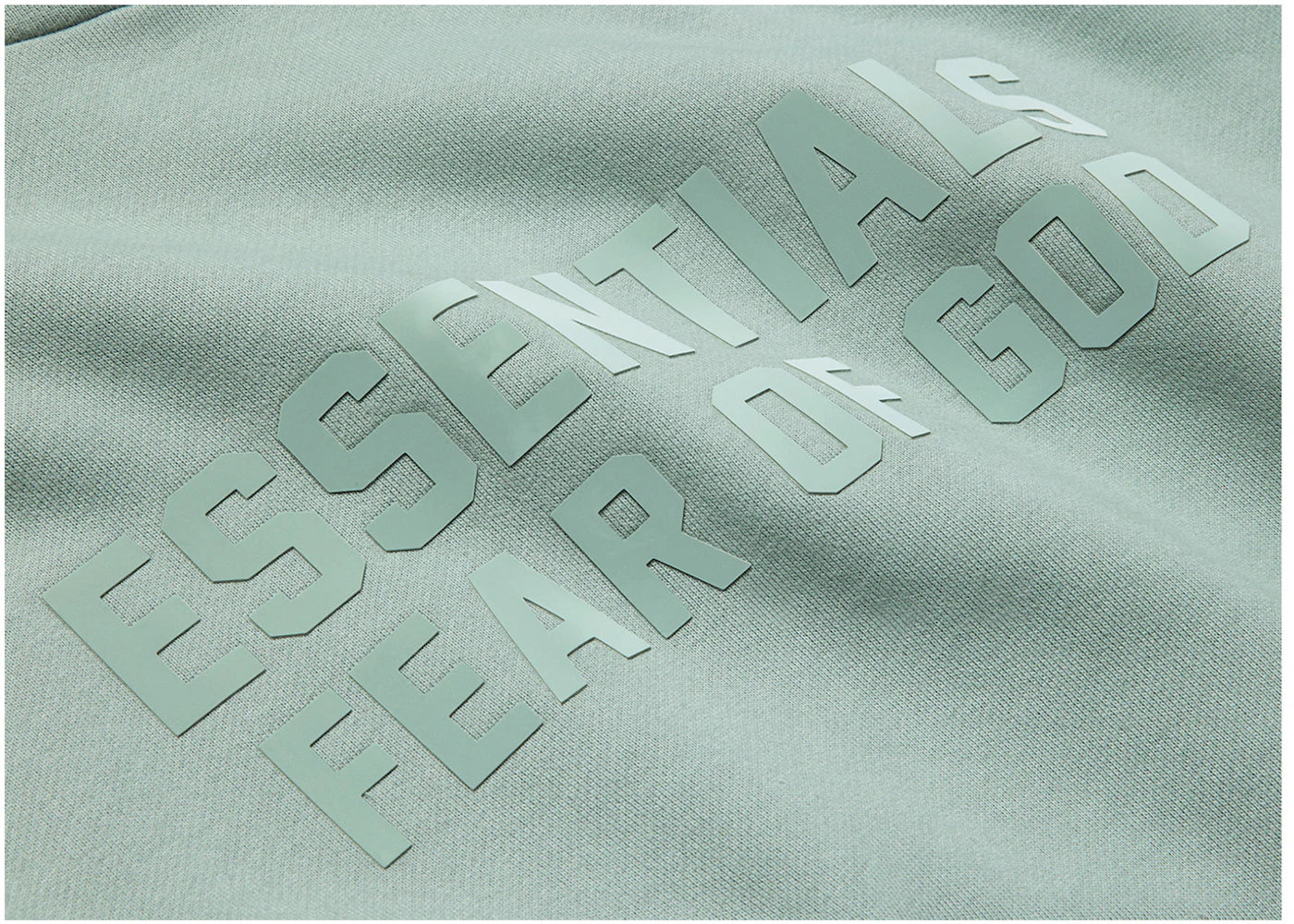 fear of god essentials hoodie sycamore