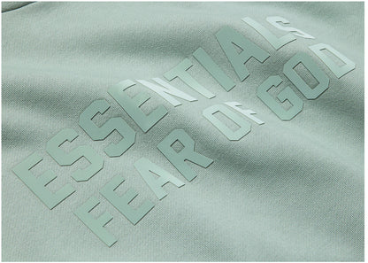 fear of god essentials hoodie sycamore