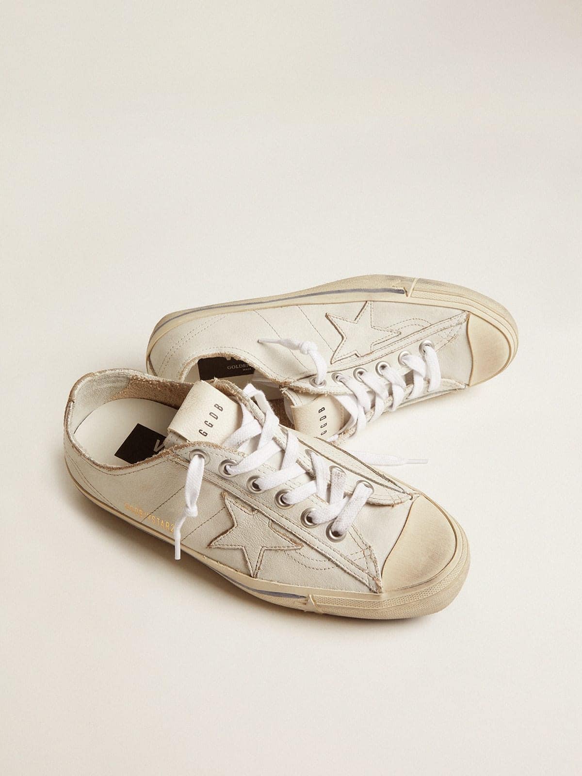 Golden Goose Mens V-Star In White Leather With White Star And Light Blue Stripe On The Foxing Mens