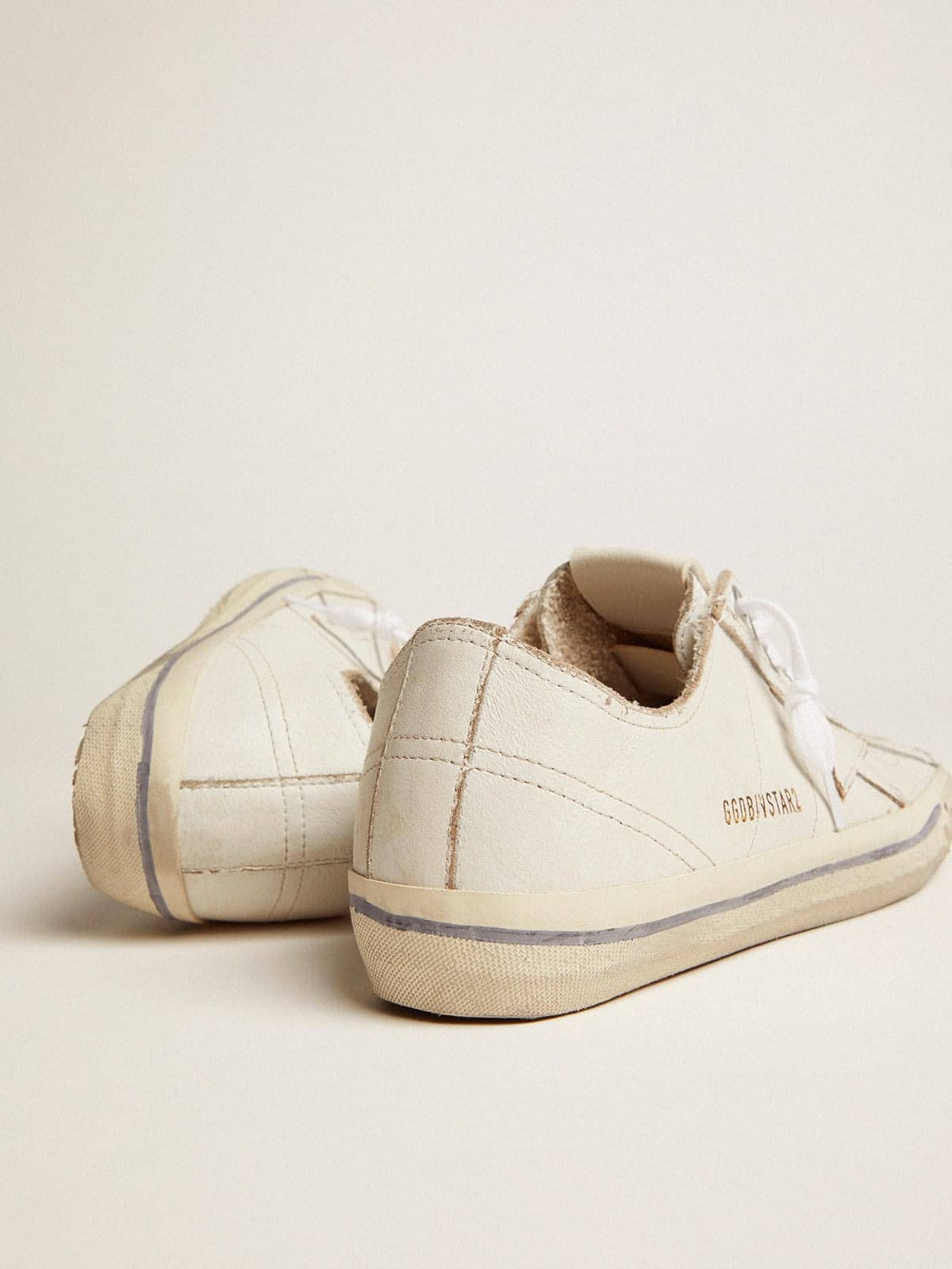 Golden Goose Mens V-Star In White Leather With White Star And Light Blue Stripe On The Foxing Mens