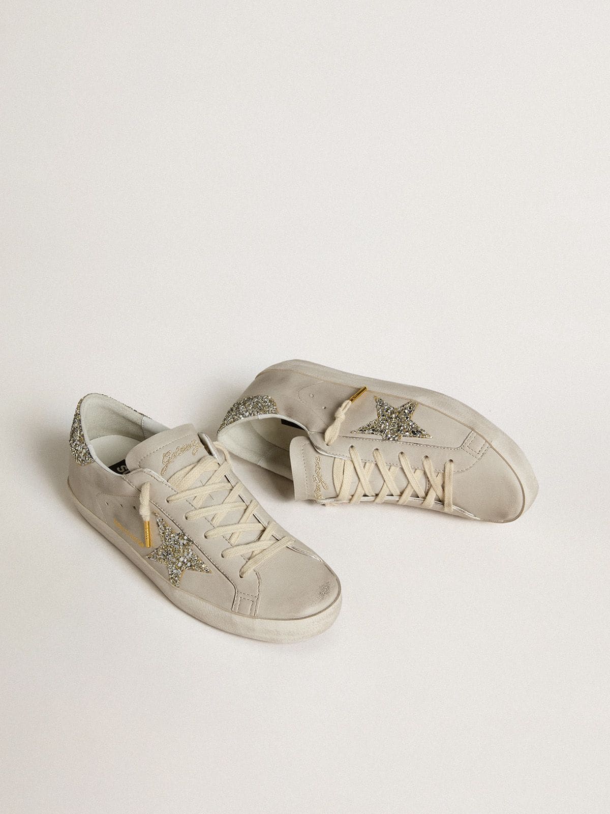 Golden Goose Womens Super-Star In Ivory Nappa Leather With Platinum Glitter Star And Heel Tab Womens