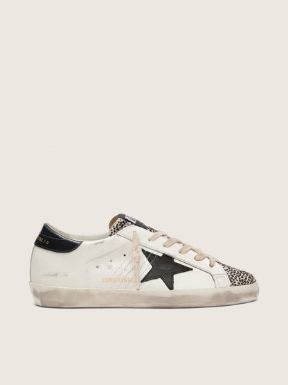 Golden Goose Womens Super-Star Ltd In White Leather With Black Star And Pony Skin Details Womens