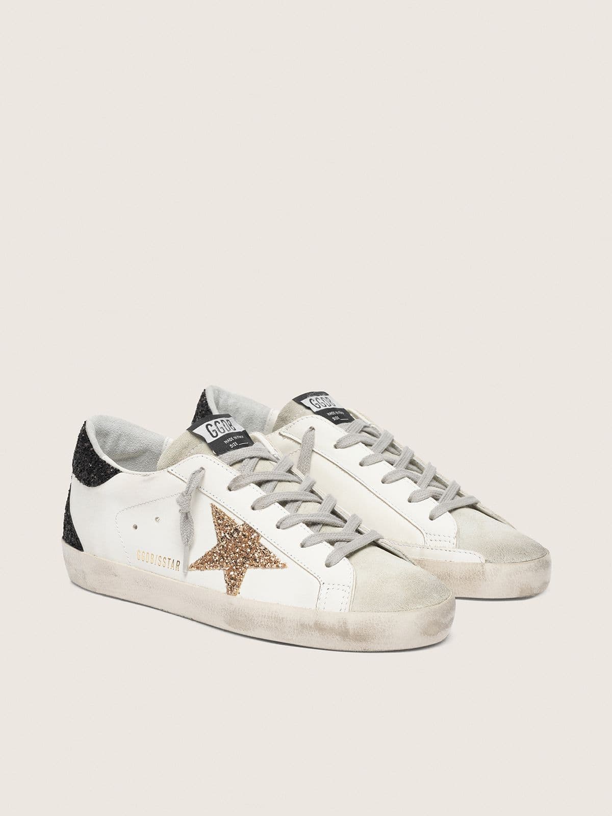 Golden Goose Womens Super-Star In Nappa Leather With Gold Glitter Star And Black Glitter Heel Tab Womens