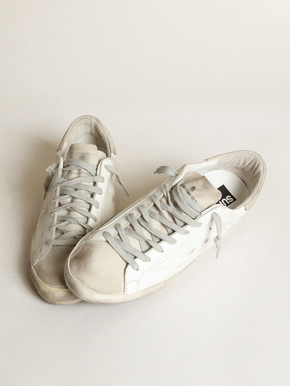 Golden Goose Womens Super-Star In White Leather With Perforated Star And Beige Nubuck Heel Tab Womens