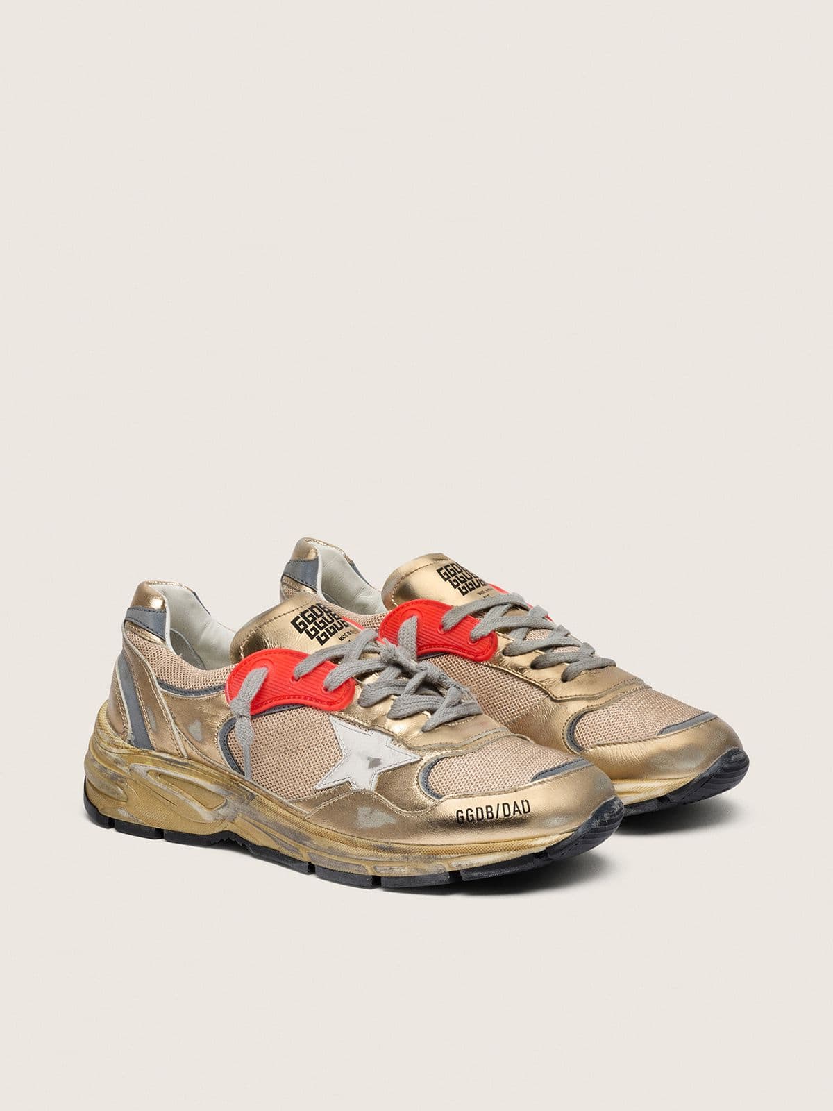 Golden Goose Womens Dad-Star In Gold Laminated Leather And Mesh With White Leather Star And Gold Leather Heel Tab Womens