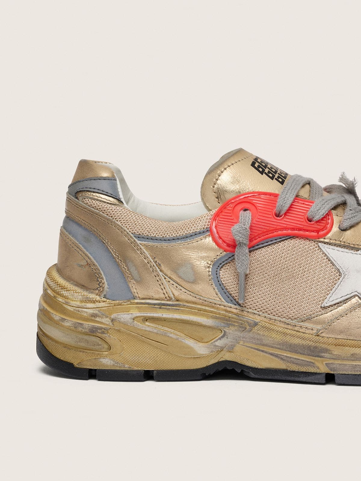 Golden Goose Womens Dad-Star In Gold Laminated Leather And Mesh With White Leather Star And Gold Leather Heel Tab Womens