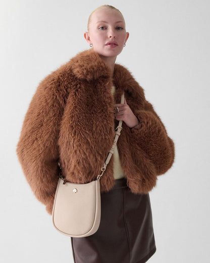 KateSpade Kayla Small Swingpack Crossbody Hay