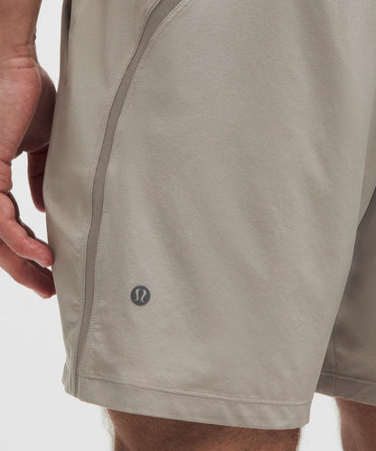 Lululemon Pace Breaker Linerless Short 7" Warm Ash Grey