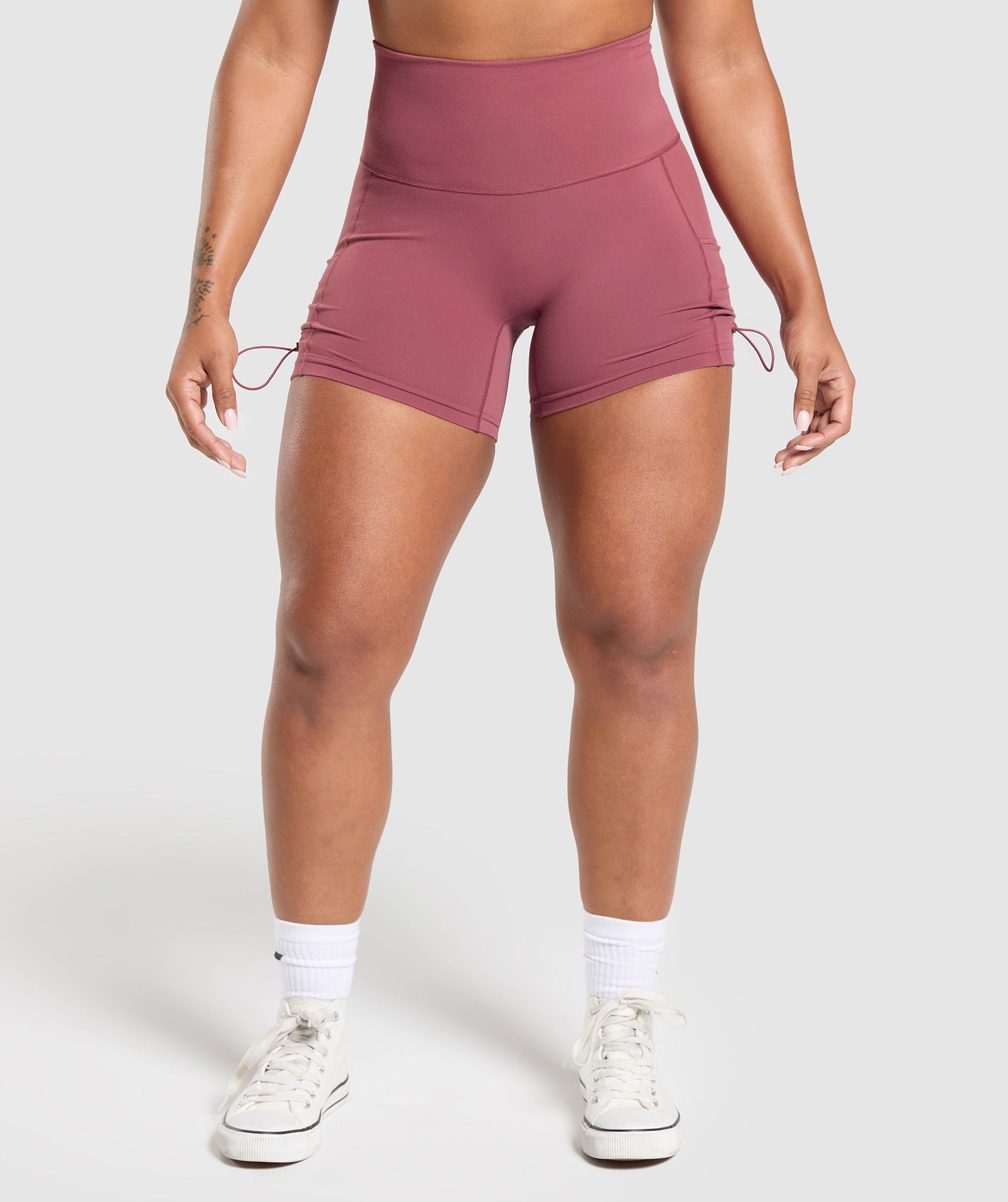 Women's Gymshark Legacy Logo Tight Shorts Washed Berry Pink