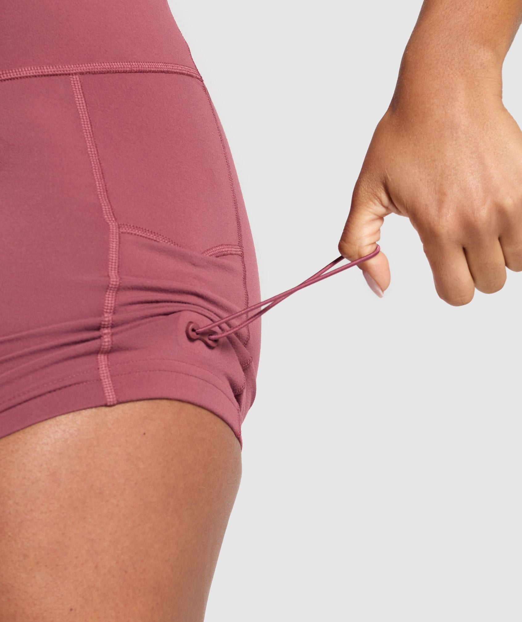 Women's Gymshark Legacy Logo Tight Shorts Washed Berry Pink