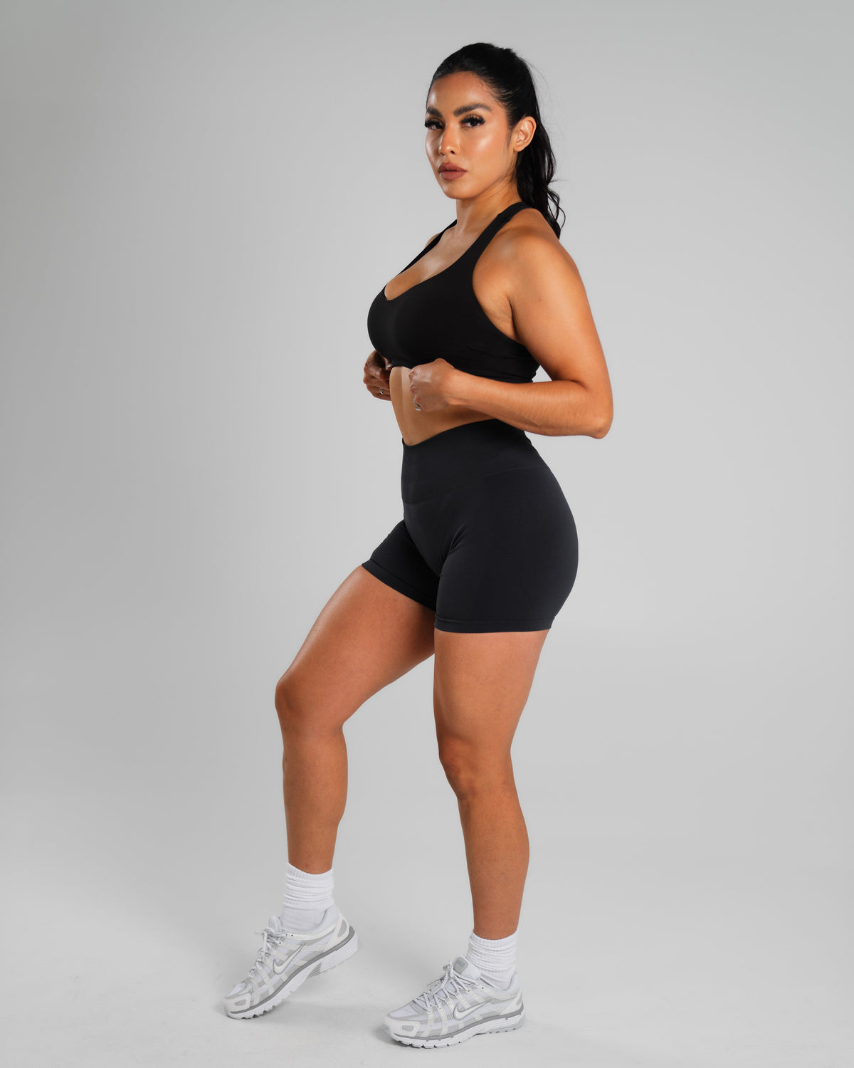 Alphalete Women's Amplify Mid Rise Short