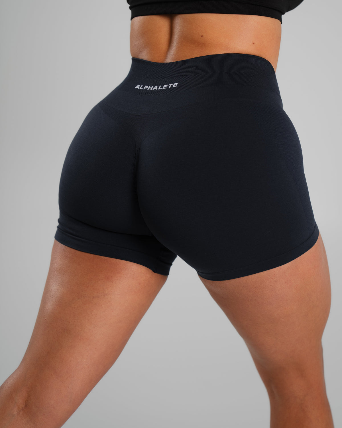 Alphalete Women's Amplify Mid Rise Short