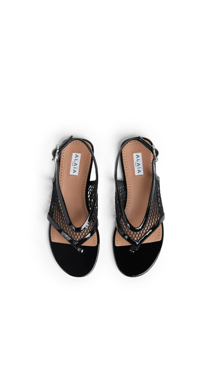 Alaïa Fishnet Thong Sandals In Patent Calfskin
