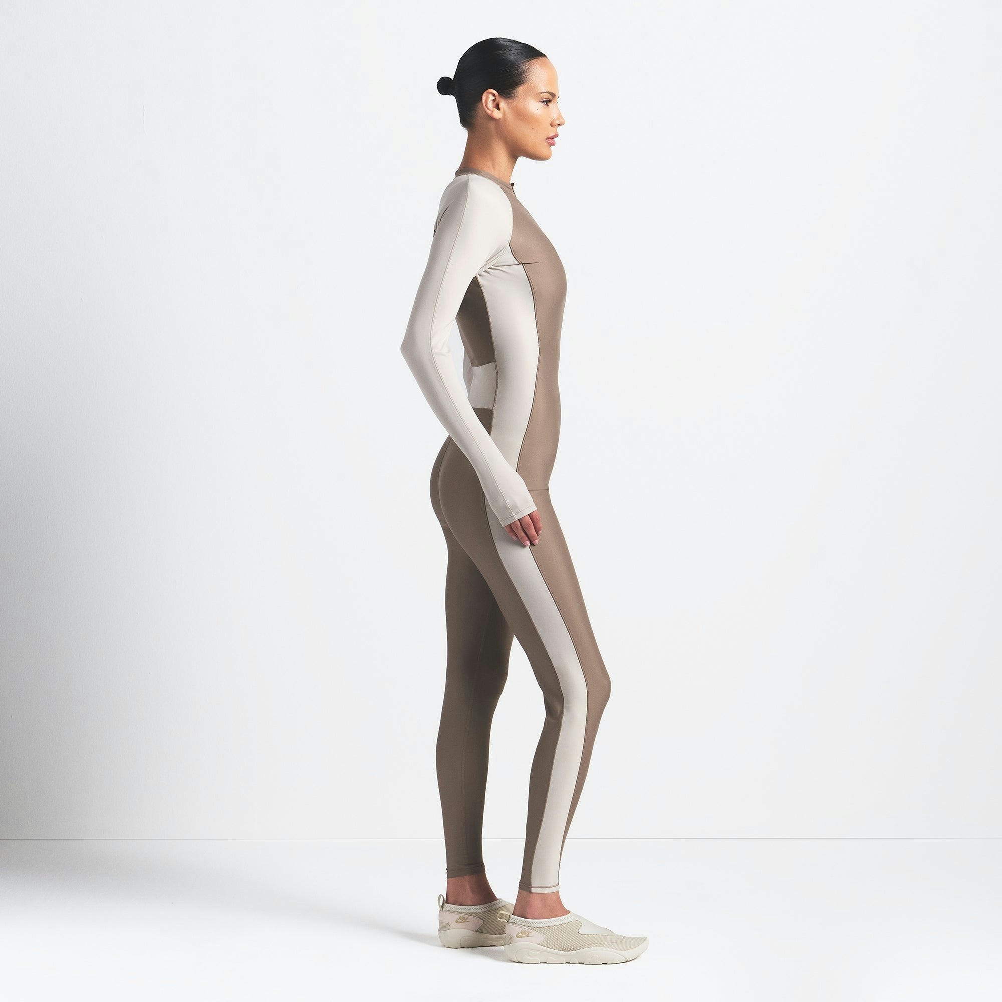 Skims Nikeskims Shine Zip Front Long Onesie Truffle And Stone