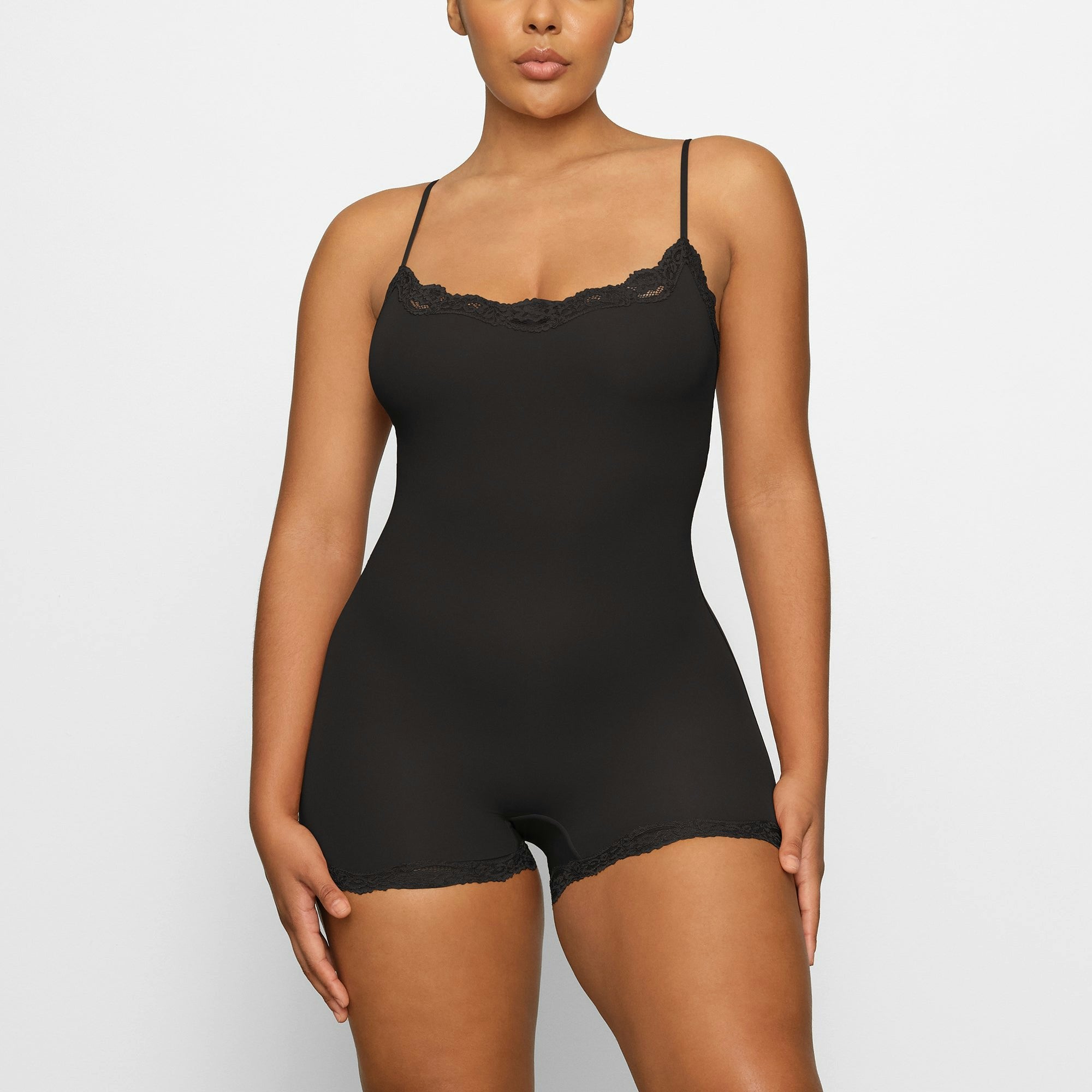 FITS EVERYBODY LACE ONESIE