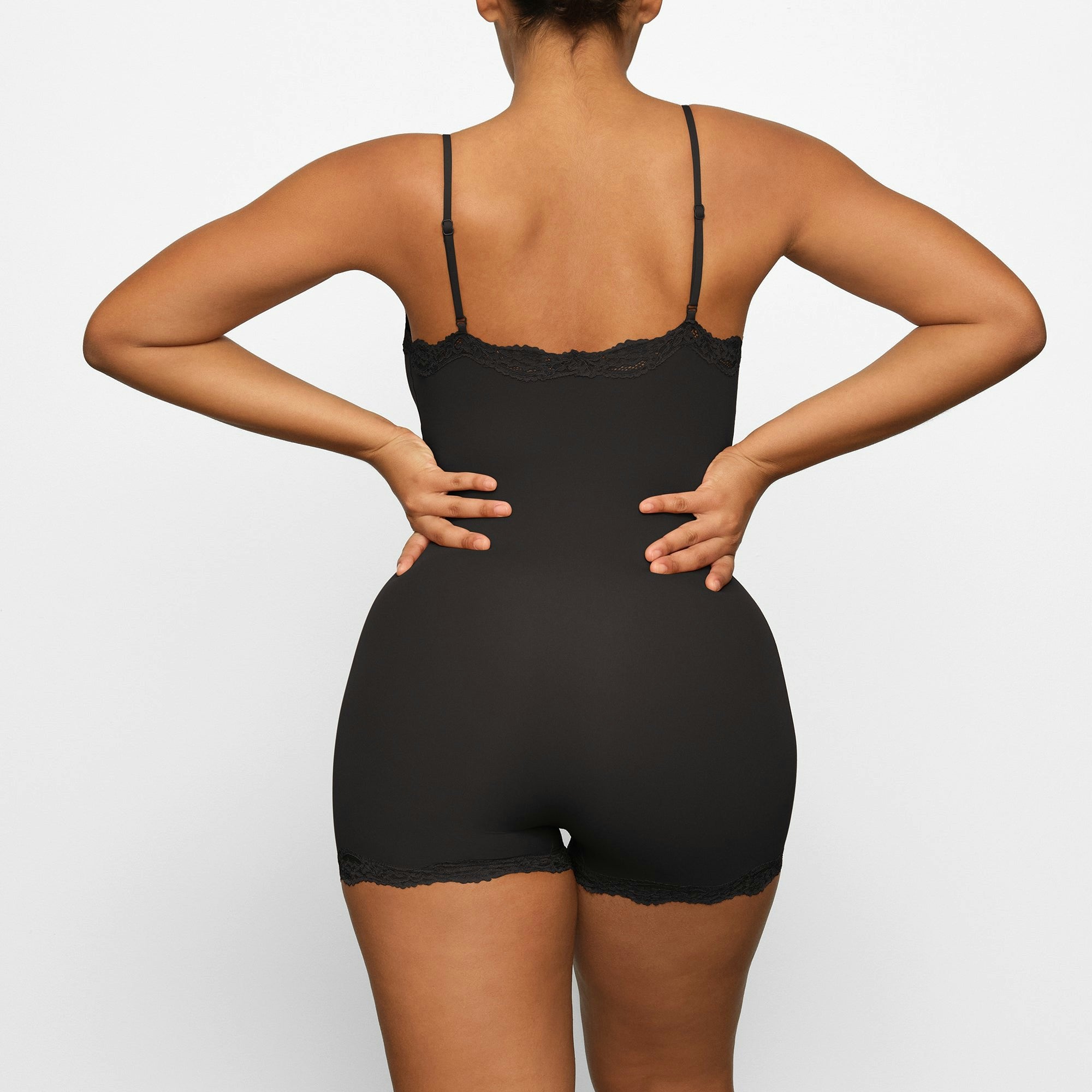 FITS EVERYBODY LACE ONESIE
