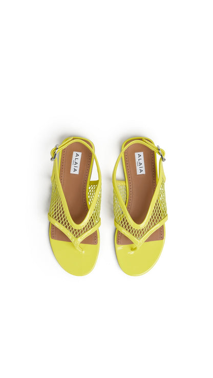 Alaïa Fishnet Thong Sandals In Patent Calfskin