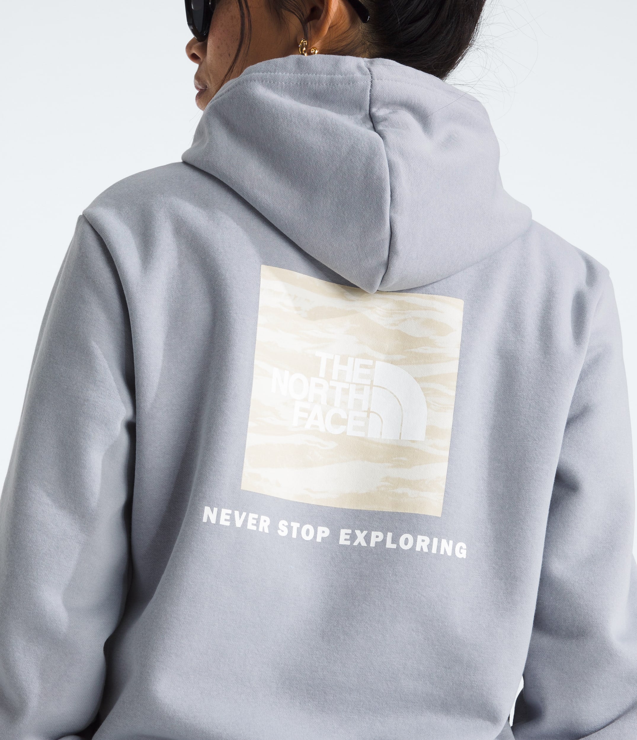 The North Face Women’s Evolution Box NSE Fill Light Hoodie—Graphic Blue Flax