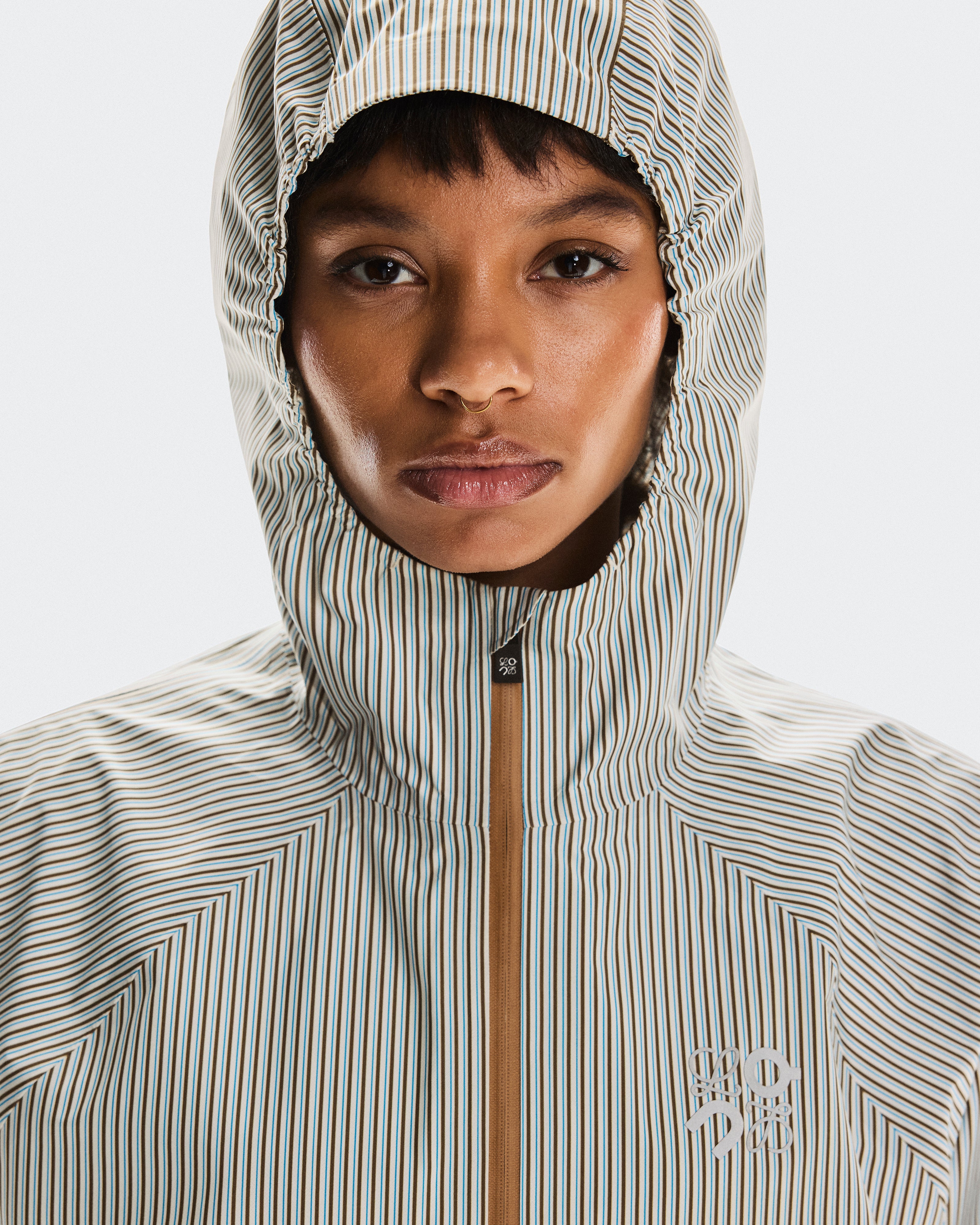 On Storm Anorak Loewe Beige | Blue