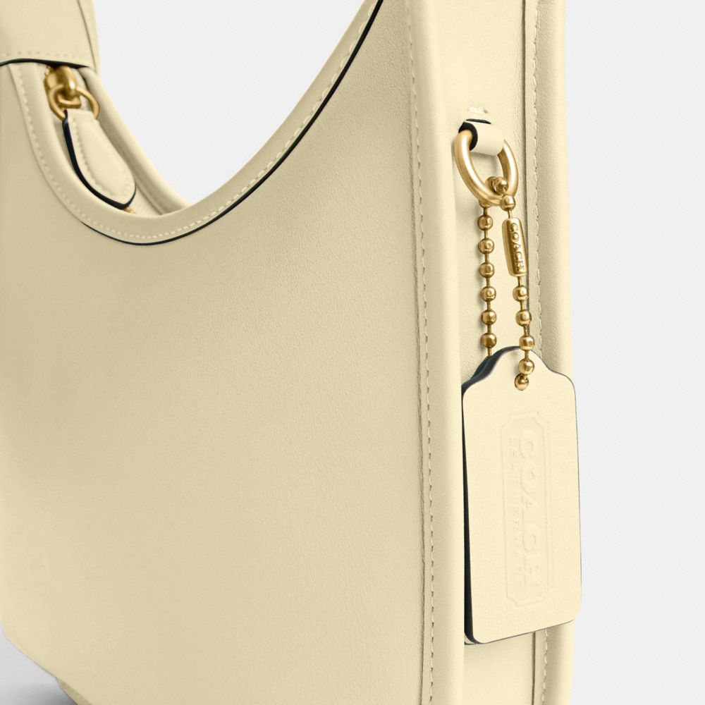 Coach Curve Zip Bag Brass Moonlight