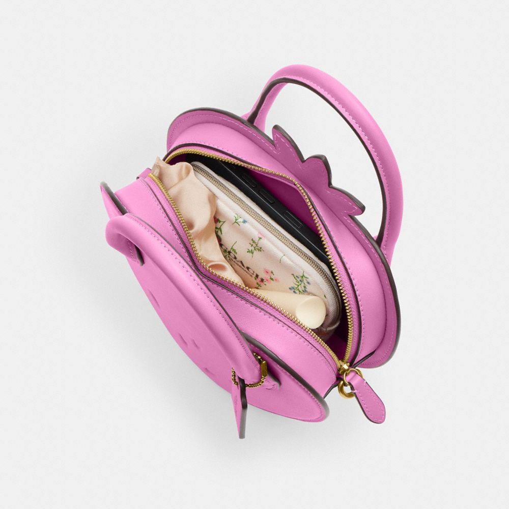Coach Strawberry Bag In Regenerative Leather Brass Fuschia
