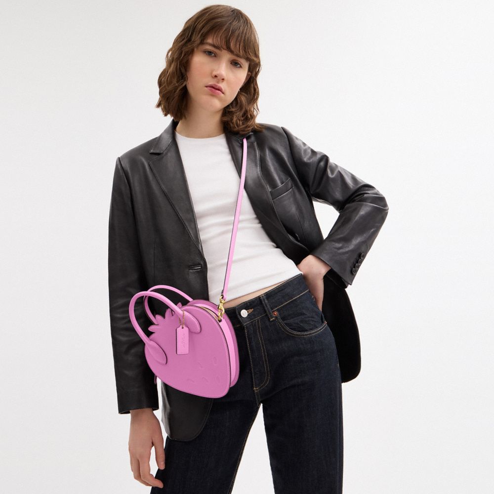Coach Strawberry Bag In Regenerative Leather Brass Fuschia