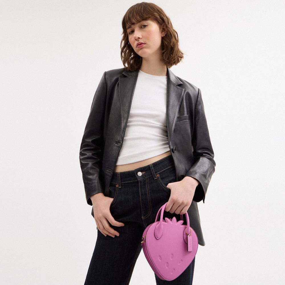 Coach Strawberry Bag In Regenerative Leather Brass Fuschia