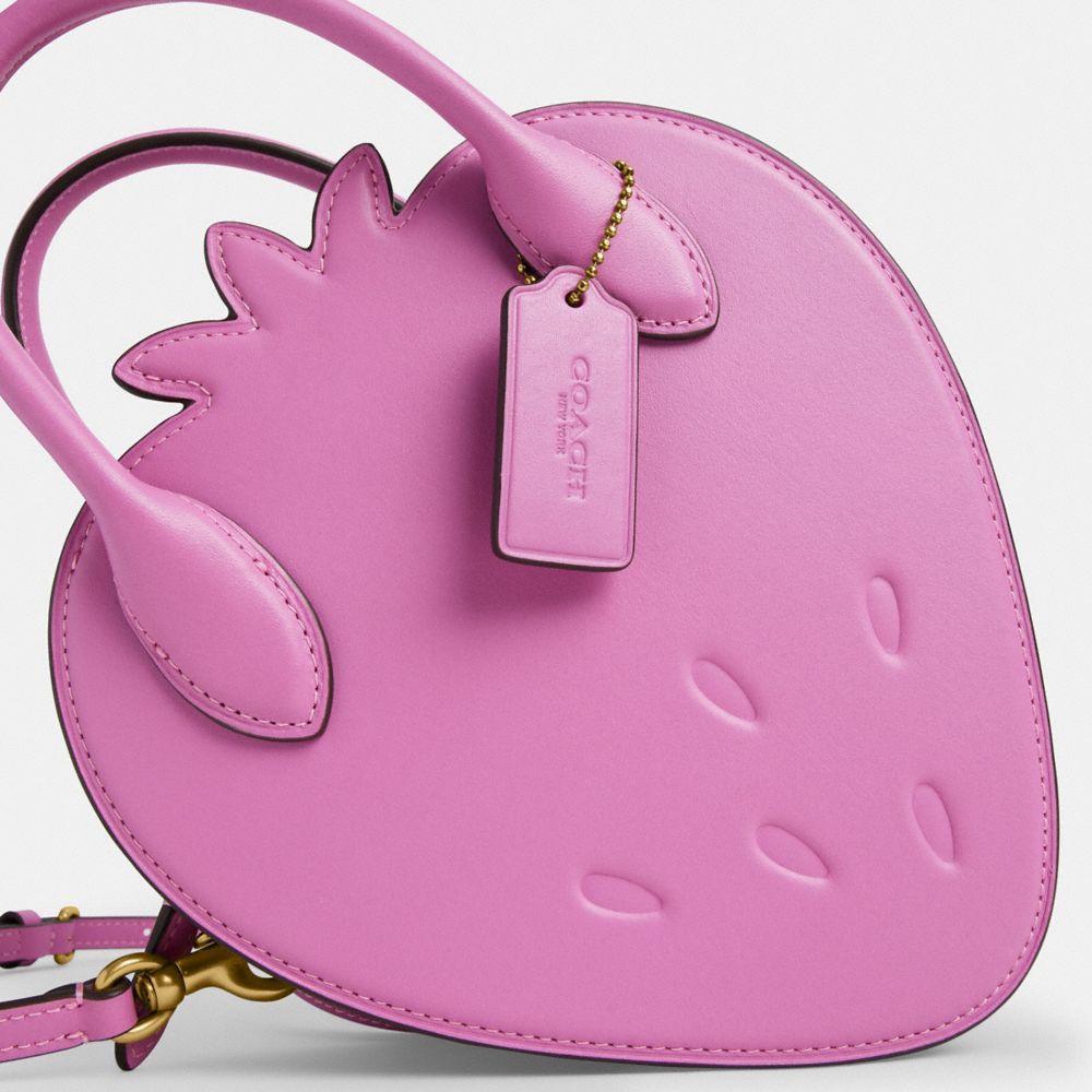 Coach Strawberry Bag In Regenerative Leather Brass Fuschia