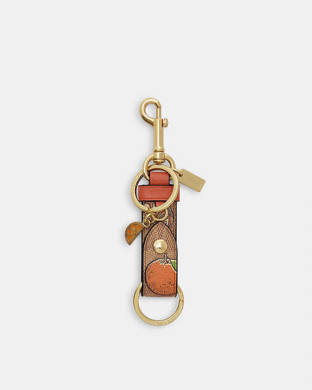 Trigger Snap Bag Charm In Signature Canvas With Orange Print Signature Canvas-Gold-Tan Multi Signature Canvas-Gold-Tan Multi