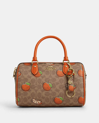 Trigger Snap Bag Charm In Signature Canvas With Orange Print Signature Canvas-Gold-Tan Multi Signature Canvas-Gold-Tan Multi